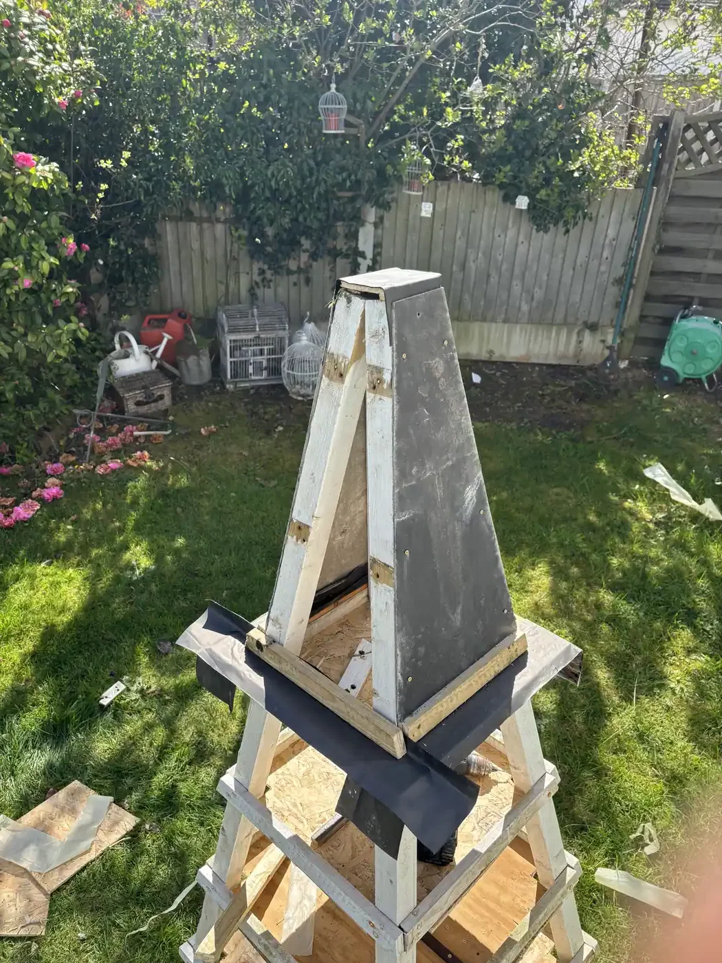 Slate spire fitted to the Romford dovecote with flashband leadwork effect at base — white dove breeding loft build. Burns Loft customer project, Essex SE England 2026.