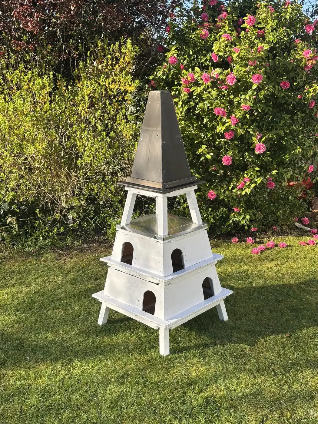 Completed dovecote painted white — Romford Essex. White dove breeding loft built by Craig and Sonnie. Birds ordered from Dean Burns at Burns Loft Dagenham. SE England 2026.